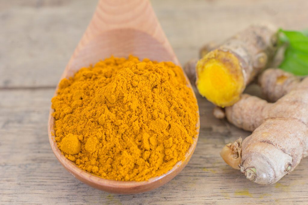 Turmeric powder, a natural ingredient mostly used in tan removal remedies for the face and healing skin.