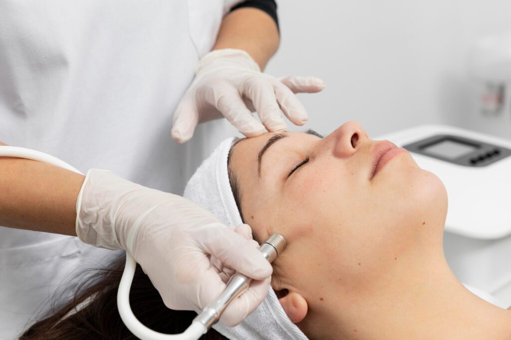 Close-up of a woman receiving an oxygen facial treatment by an expert to hydrate and rejuvenate skin.