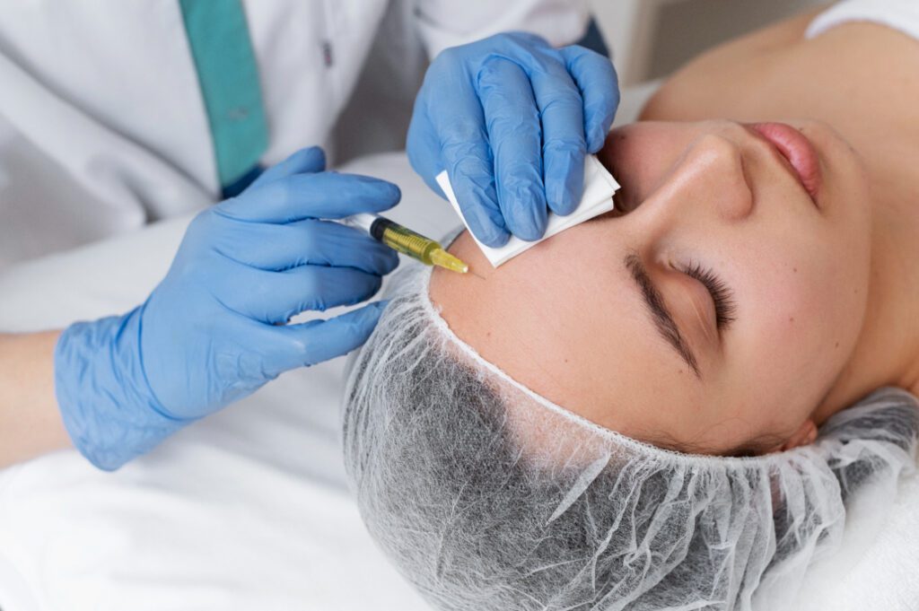 Young woman receiving glutathione injection for skin whitening, supervised by a dermatologist. Glutathione injection side effects can vary.